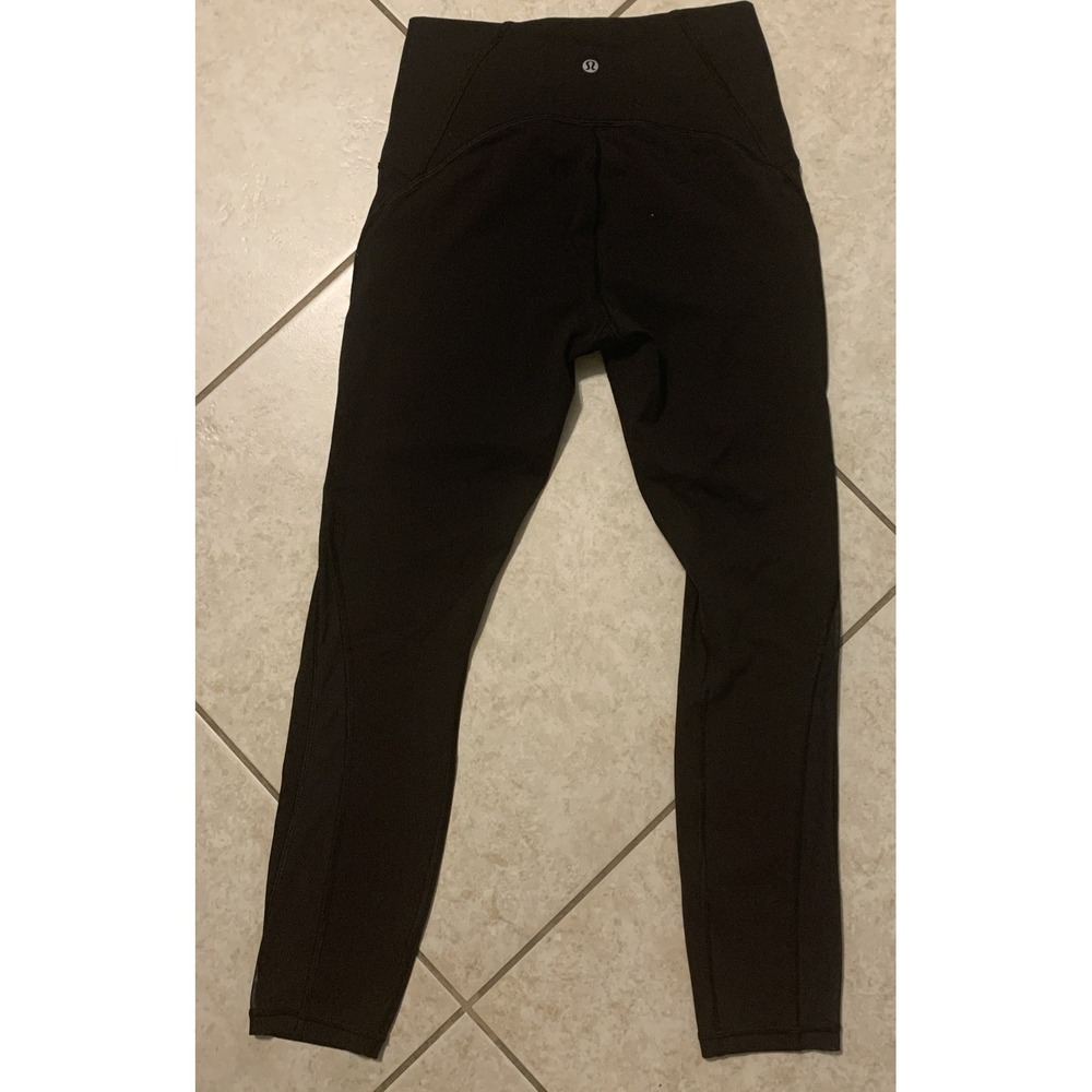 Lululemon Women's Black  Leggings with Mesh Panels on the Legs — Size 6